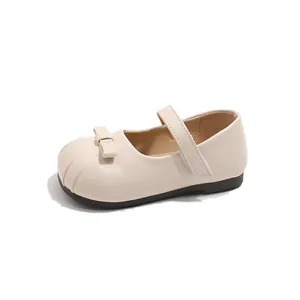 Elegant beige toddler girl princess flat shoes with decorative bow and hook-and-loop strap