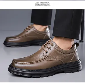 Close-up view of men's brown textured leather dress shoes with durable non-slip soles.