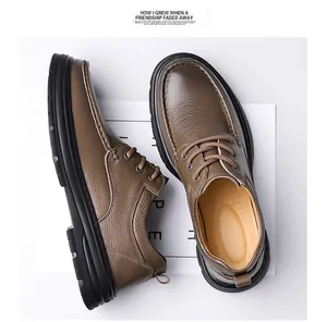 Top-down view of brown leather casual men's shoes showing natural grain texture