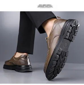 Detailed view of non-slip rubber sole and genuine brown leather upper on men's shoe