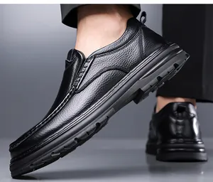 Detailed side view of premium black top-grain leather men's slip-on casual shoe