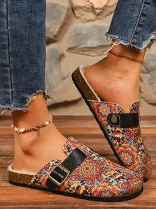 Detailed view of bohemian printed clogs with adjustable buckle and cozy lining