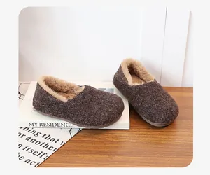 Detailed close-up of warm brown fuzzy slippers featuring soft faux fur lining for winter