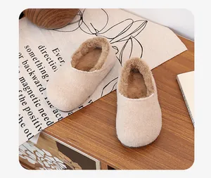 Close-up view of cozy beige fleece-lined mule loafers showing soft interior texture