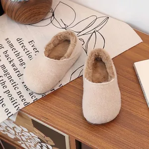Warm beige fleece-lined slip-on mule slippers with soft sole for winter comfort