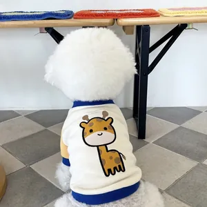 Back view of a dog wearing a white pet sweatshirt with a cute giraffe cartoon design