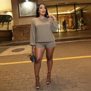 Detailed view of the stylish solid color long-sleeved two-piece romper set.