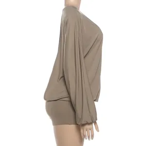 Side view of an elegant solid color round neck long sleeve romper on mannequin