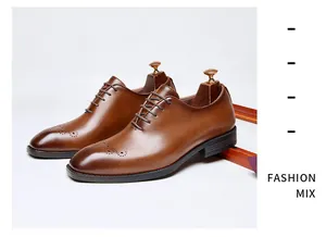 Macro view of brown brogue leather oxford shoes highlighting craftsmanship and style