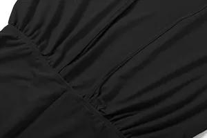 Detailed close-up showing the elegant fabric and backless design of a black women's jumpsuit