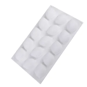 Detail view of 15-cavity lemon shaped white silicone mold for baking and DIY crafts