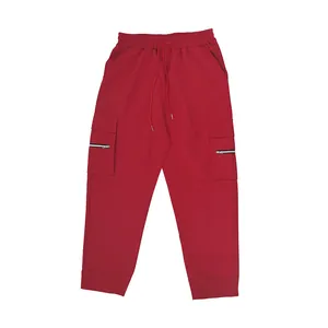 Pantalones cargo rojos para hombre con cintura elástica y bolsillos con cremallera