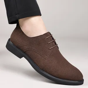 Detailed side view of brown suede men's Derby shoes showing texture and lace-up design
