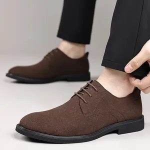 Close-up of brown suede derbies featuring a stylish matte finish and classic laces.