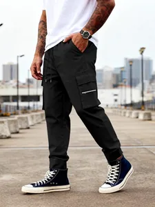 Pantalones cargo de exterior negros para hombre con bolsillos y cordón ajustable