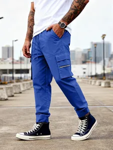 Pantalones cargo azules de exterior para hombre con múltiples bolsillos y cordón