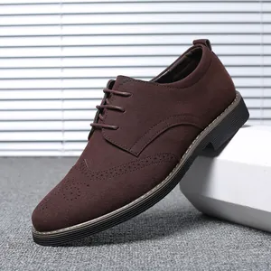 Men's brown suede Brogue shoes with classic wingtip design and lace-up closure.