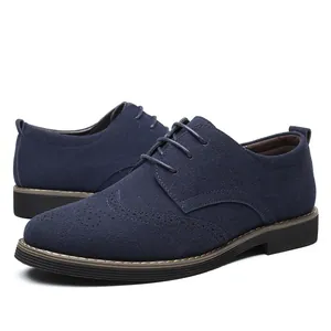 Stylish blue suede men's Brogue shoes featuring elegant perforated wingtip details