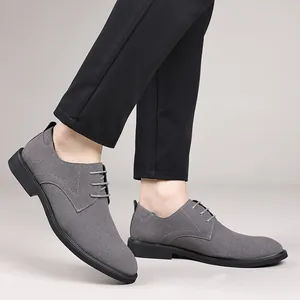 Close-up of grey British style lace-up men's casual shoes with a professional matte finish