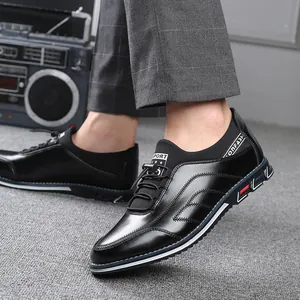 Stylish men's black casual leather shoes with soft sole and decorative stitching.