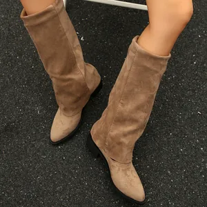 Detailed view of women's khaki suede slouch boots with pointed toe and low heel