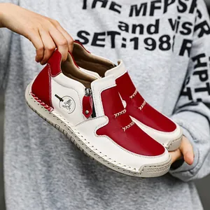 Stivaletti in pelle da donna bicolore rosso e bianco con dettaglio zip e cuciture
