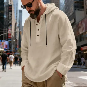 Detail of breathable linen hooded Henley shirt for men in beige, loose fit casual style