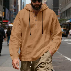 Detailed view of camel linen Henley hoodie showing natural texture and hood design