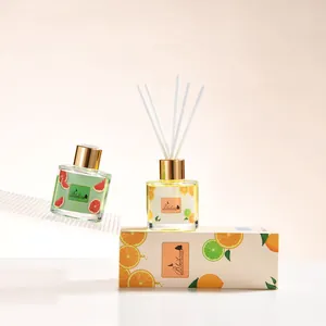 Luxury reed diffuser set with citrus and herbal essential oils in stylish glass bottles