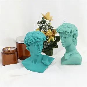 Set of David bust scented candles in teal and mint green for Nordic style home decoration