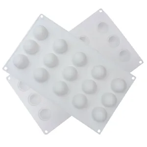 Detailed view of white 15-cavity round silicone mold for chocolate pearls and cake