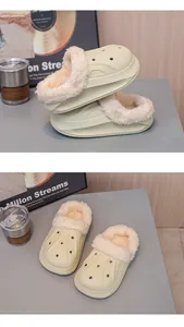 High-quality detail of children's warm fleece-lined waterproof winter slippers in cream