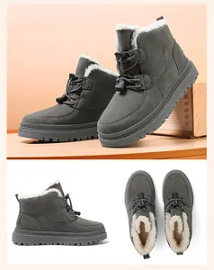 Detailansicht der Plüschfütterung und Anti-Rutsch-Sohle grauer Kinder-Schneestiefel.
