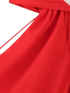Close-up detail showing the smooth red satin fabric texture and elegant draping effect