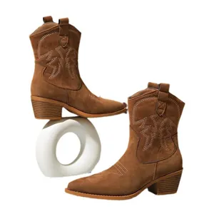 Vintage brown suede western cowboy boots featuring embroidery and thick stacked heels