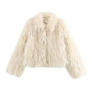 Close-up view of a shaggy cream faux fur coat showing soft textured luxury fibers