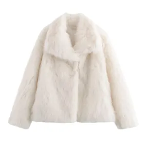 Close-up of white faux fur coat showing soft plush texture and wide collar