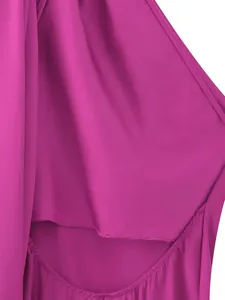 Detailed close-up showing the smooth satin fabric and neat stitching of the magenta dress
