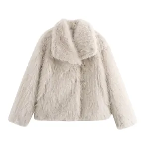 High-quality detail of an elegant beige faux fur jacket featuring a wide lapel collar