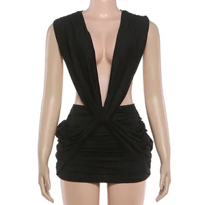 Close-up detail of a sexy black deep V-neck sleeveless bodycon dress with ruching.