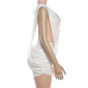Professional side view of a sexy white sleeveless ruched mini dress with deep V-neck