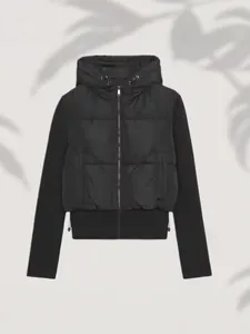 Modern black spliced hooded puffer jacket with cinched waist and front zipper closure
