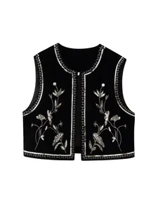 Elegante zwarte fluwelen vest met bloemen pailletten borduurwerk en open voorkant