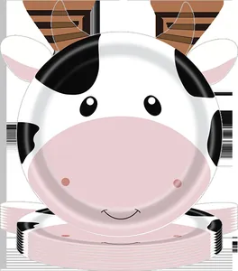 Detailed view of cute cow shaped disposable paper plates for farm themed parties.