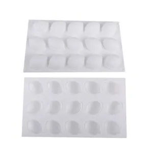 Detailed view of 15-cavity lemon-shaped white silicone mold for DIY baking mousse.