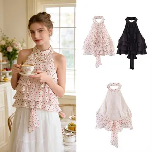 Elegantes Polka-Dot-Halter-Top aus Georgette mit Volants und einer Schleife am Rücken.
