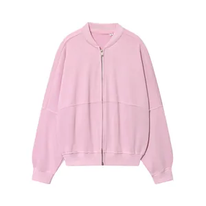 Front view detail of a minimalist pink women's zip-up bomber sweatshirt with ribbed cuffs