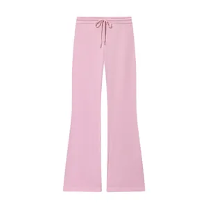 Casual pink wide-leg drawstring trousers showing front flare design and fabric texture