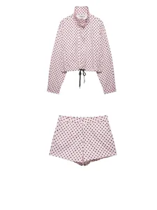 Fashionable pink and black polka dot two-piece jacket and mini shorts set for women