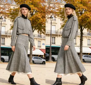 Vintage houndstooth plaid bomber jacket and midi skirt set shown on model in street